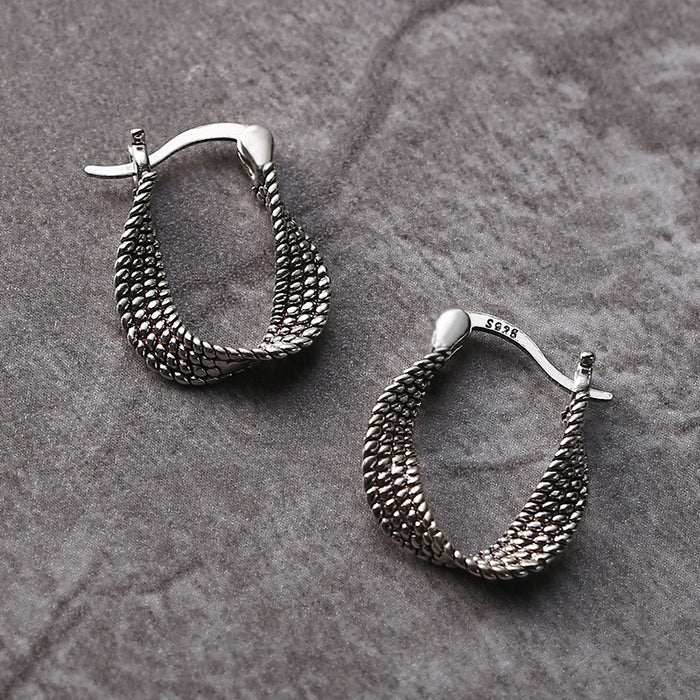 Stylish silver earrings with an asymmetrical design