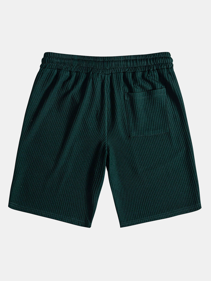 Shirt and shorts with nervous button