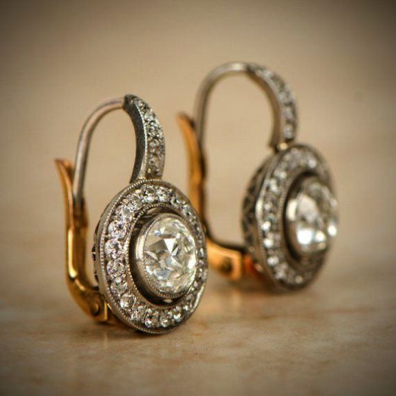 Crystal-embellished vintage earrings in gold and silver