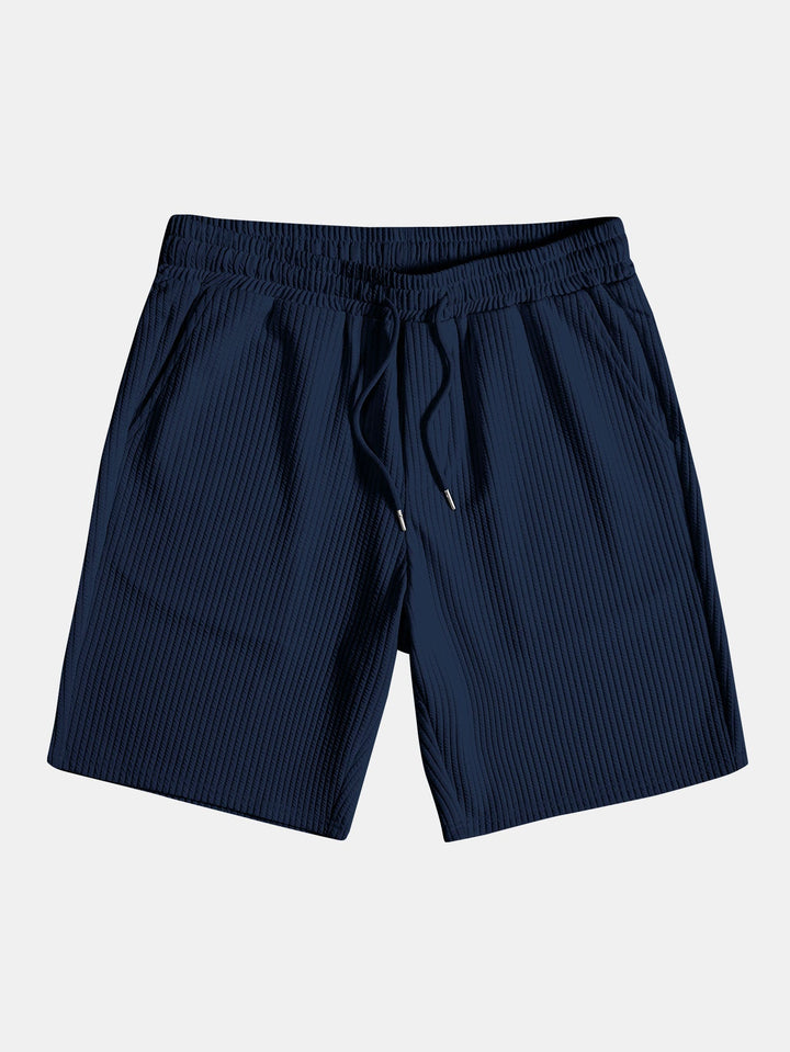 Shirt and shorts with nervous button