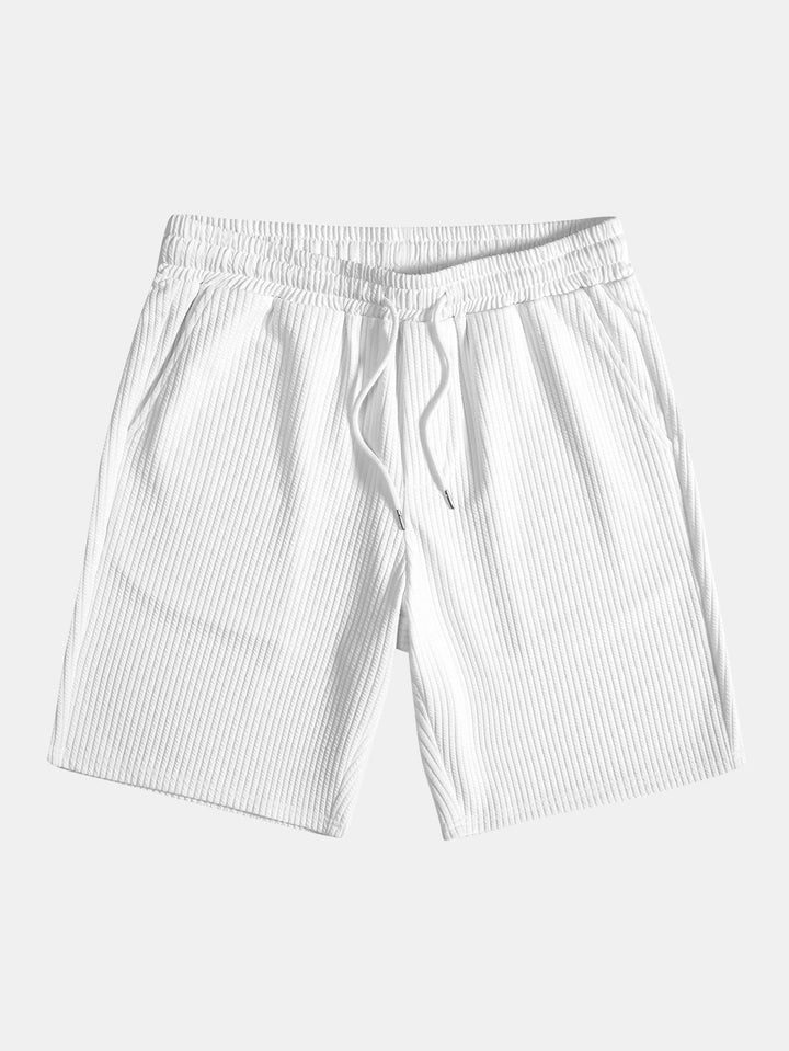 Shirt and shorts with nervous button