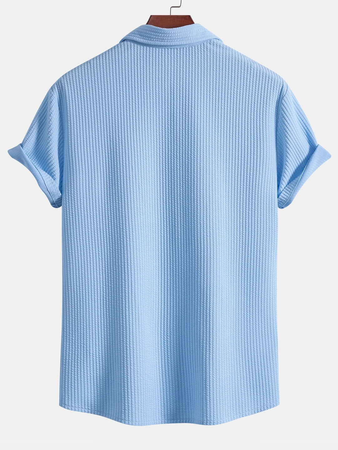 Shirt and shorts with nervous button